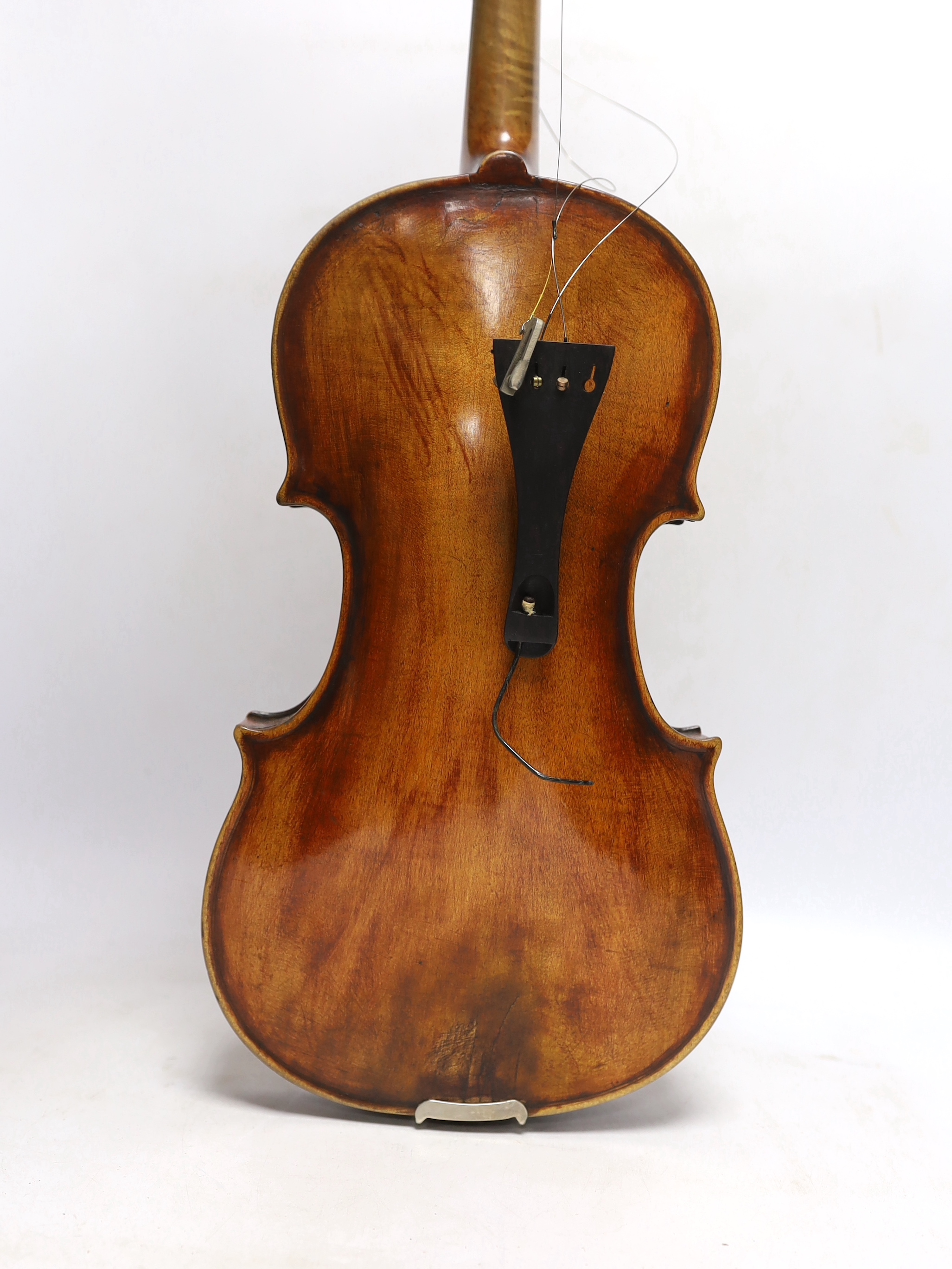 A violin labelled 'Albani Palermo', cased, length of back 35.5cm